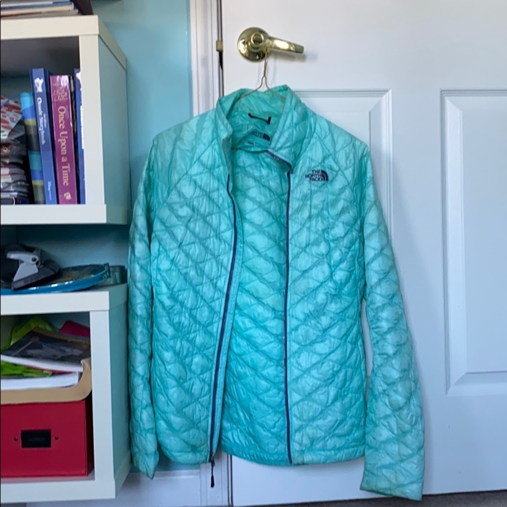 Women’s light blue North Face fall/running jacket